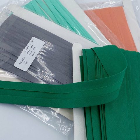 Pre-folded bias tape – Industrial cutting by Sagaert